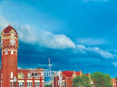 Photo Contest Winner - Week 2  A Storm Brewing Over The Clocktower  