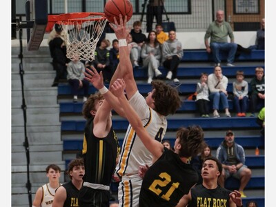 Saline Holds Off Flat Rock 57-50