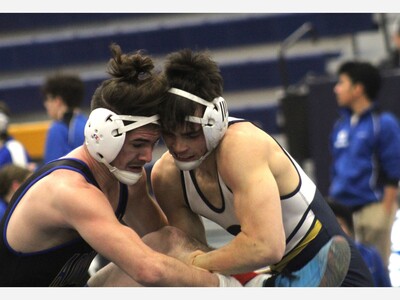 Chelsea Wrestlers Sweep Pair in SEC