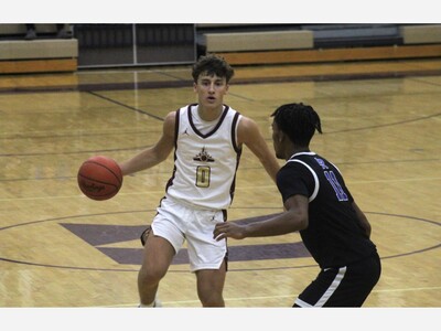 Dexter Pulls Away for Win Over Monroe