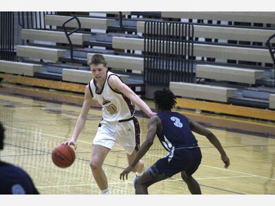 Dexter Pulls Away from Toledo Woodward 60-46
