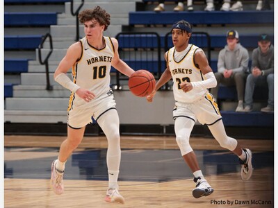 Saline Pulls Away from Dexter in SEC Red Battle
