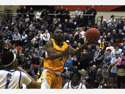 Late Rally Ends Saline Basketball Season