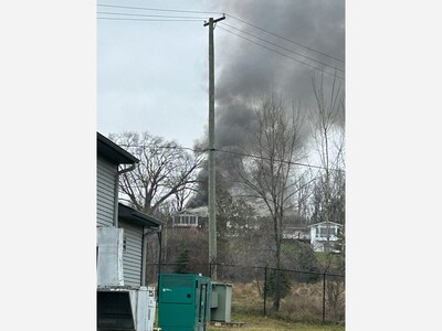 Scio Township firefighters needed to remove a Tesla EV from a garage in order to fight a fire