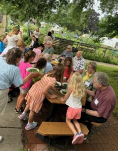 Senior Center members working with Camp Gabika kids