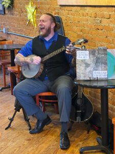 Banjo, Bluegrass, and Stories: A Night with Mike Evans at Carrigan Café