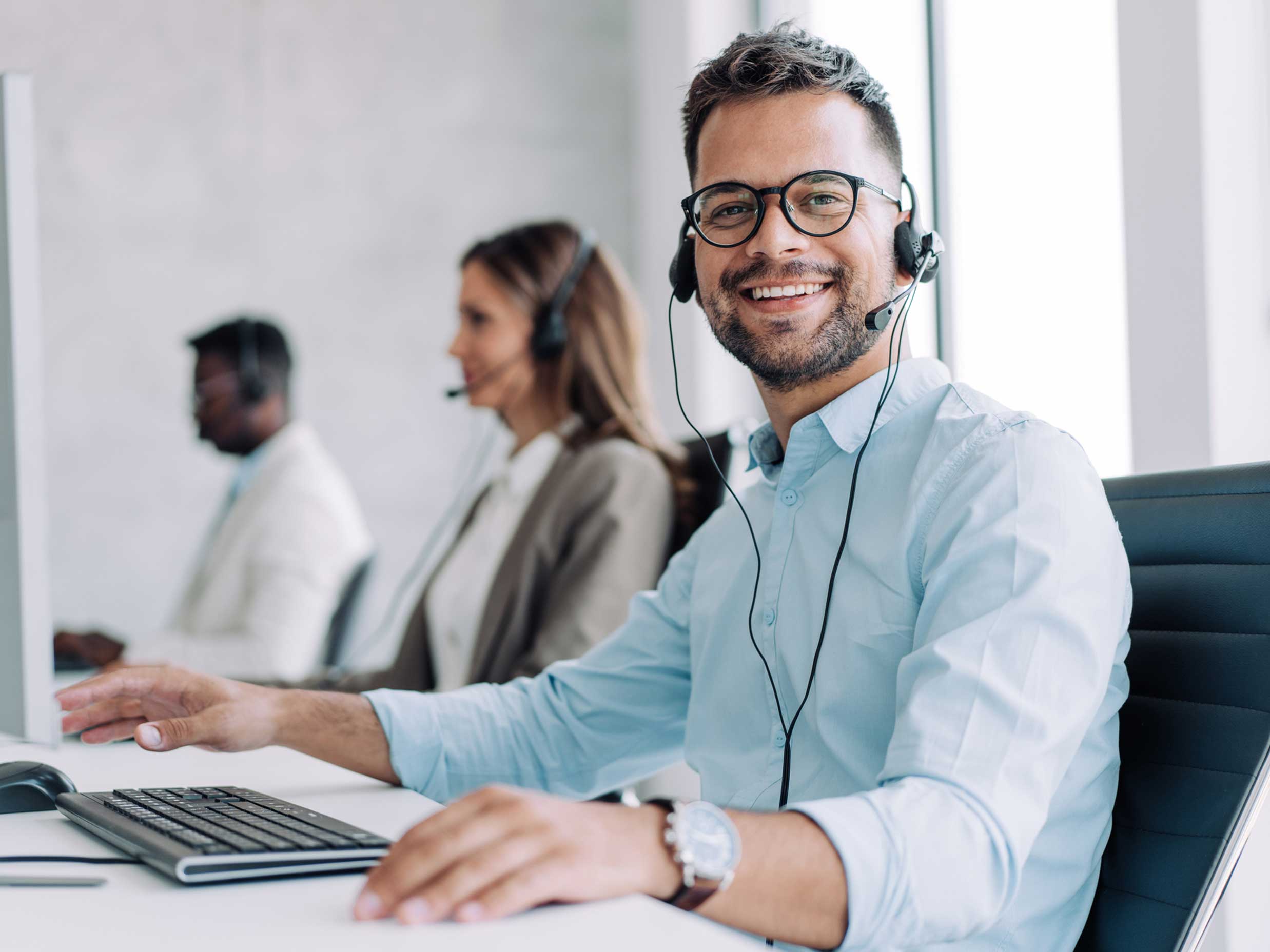 Man smiling while providing information on the best LLC services in Michigan.