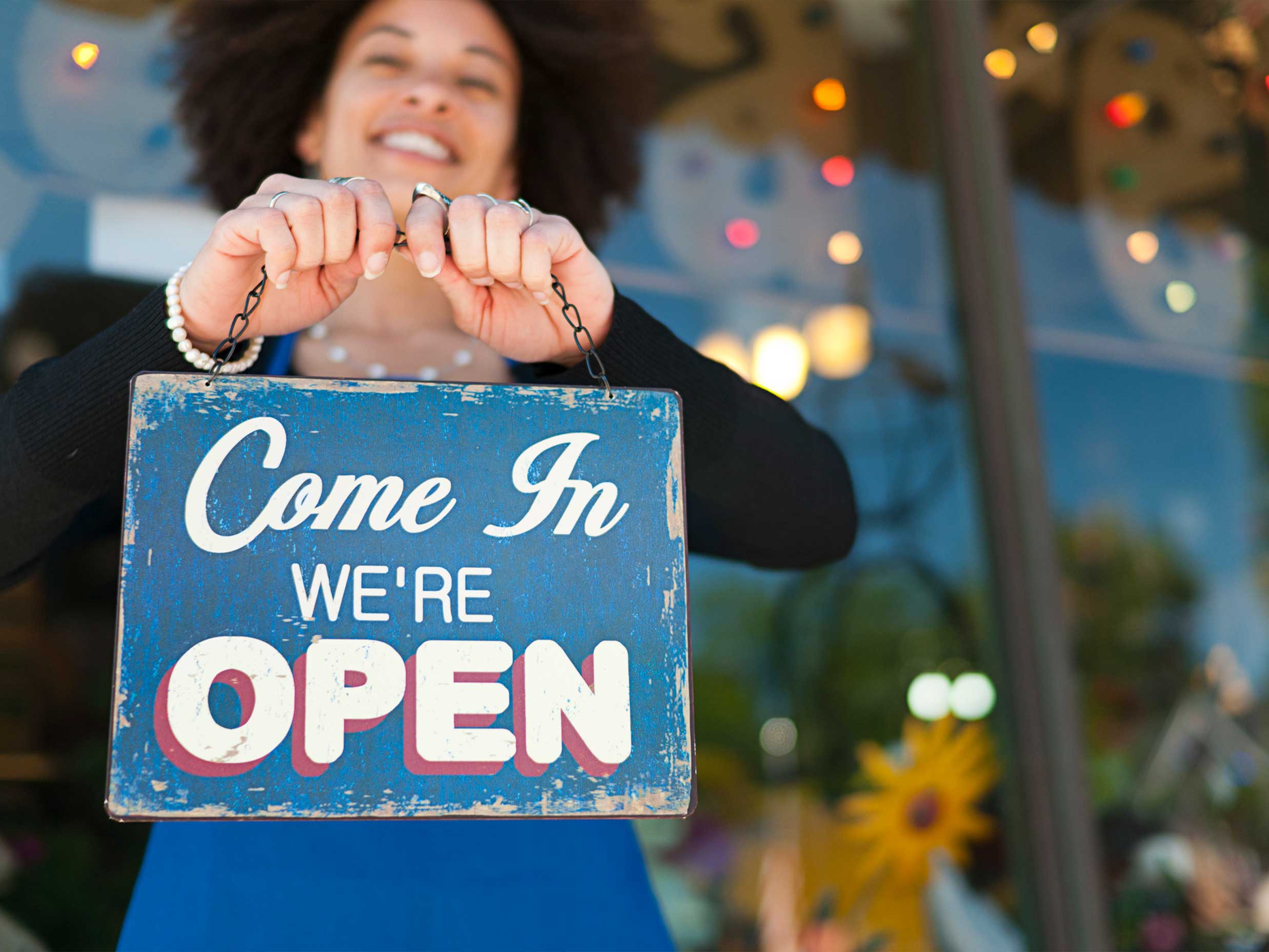 Small business owner opening up her business for the very first time