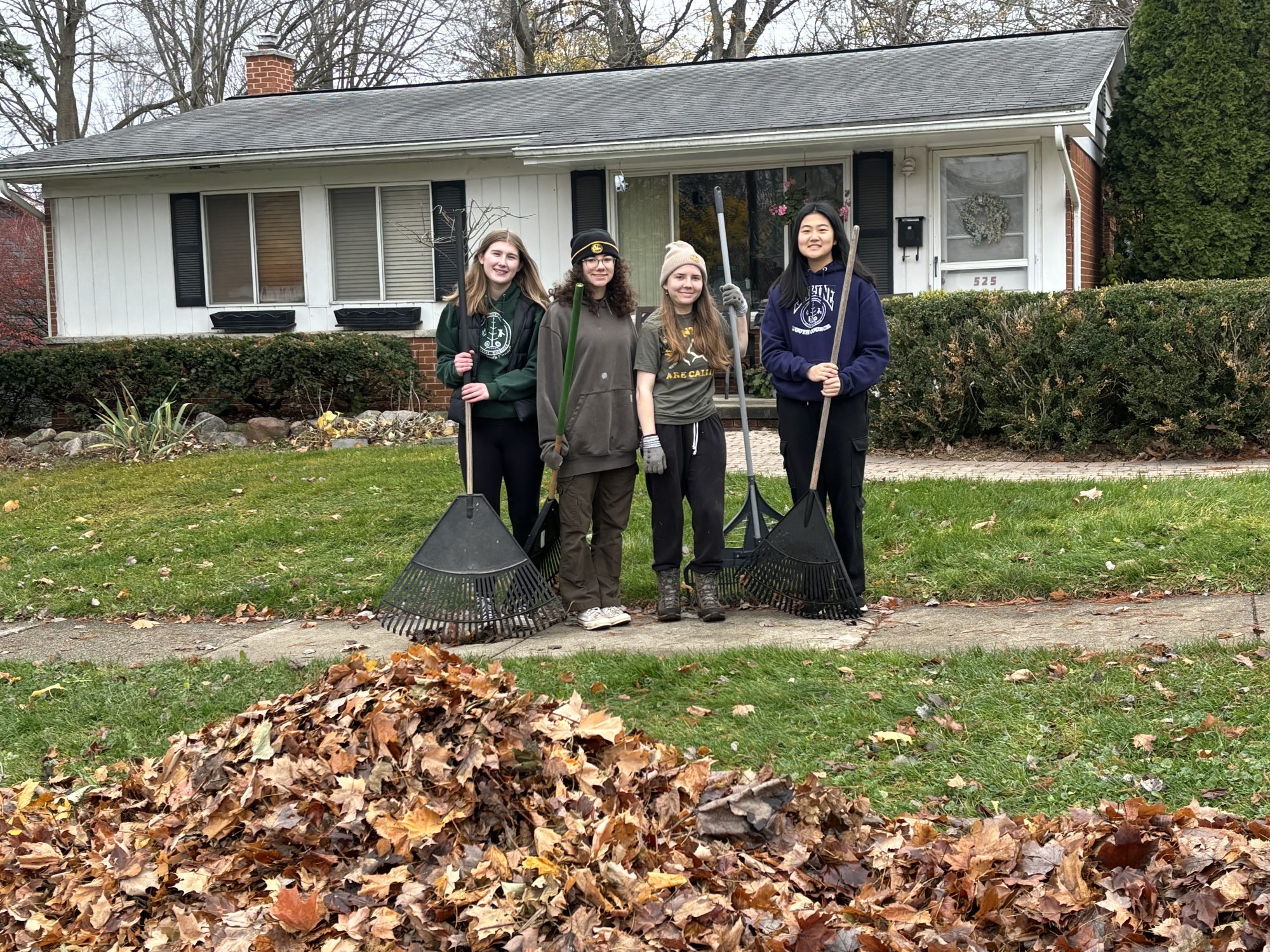 Saline Students Volunteer for Leaf Raking and Snow Shoveling