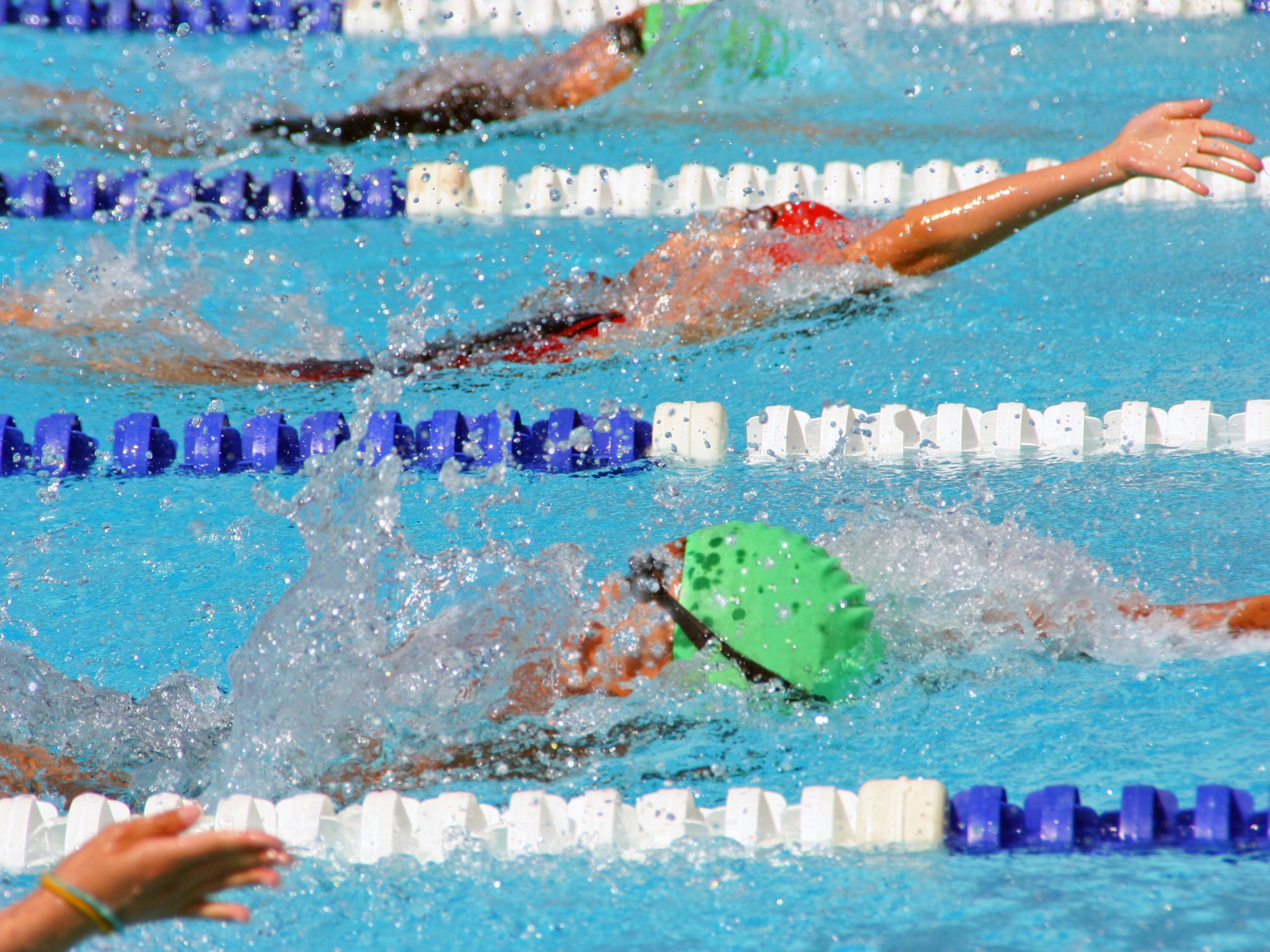 Saline Girls Swim and Dive Outlasts Skyline in Tight SEC Meet