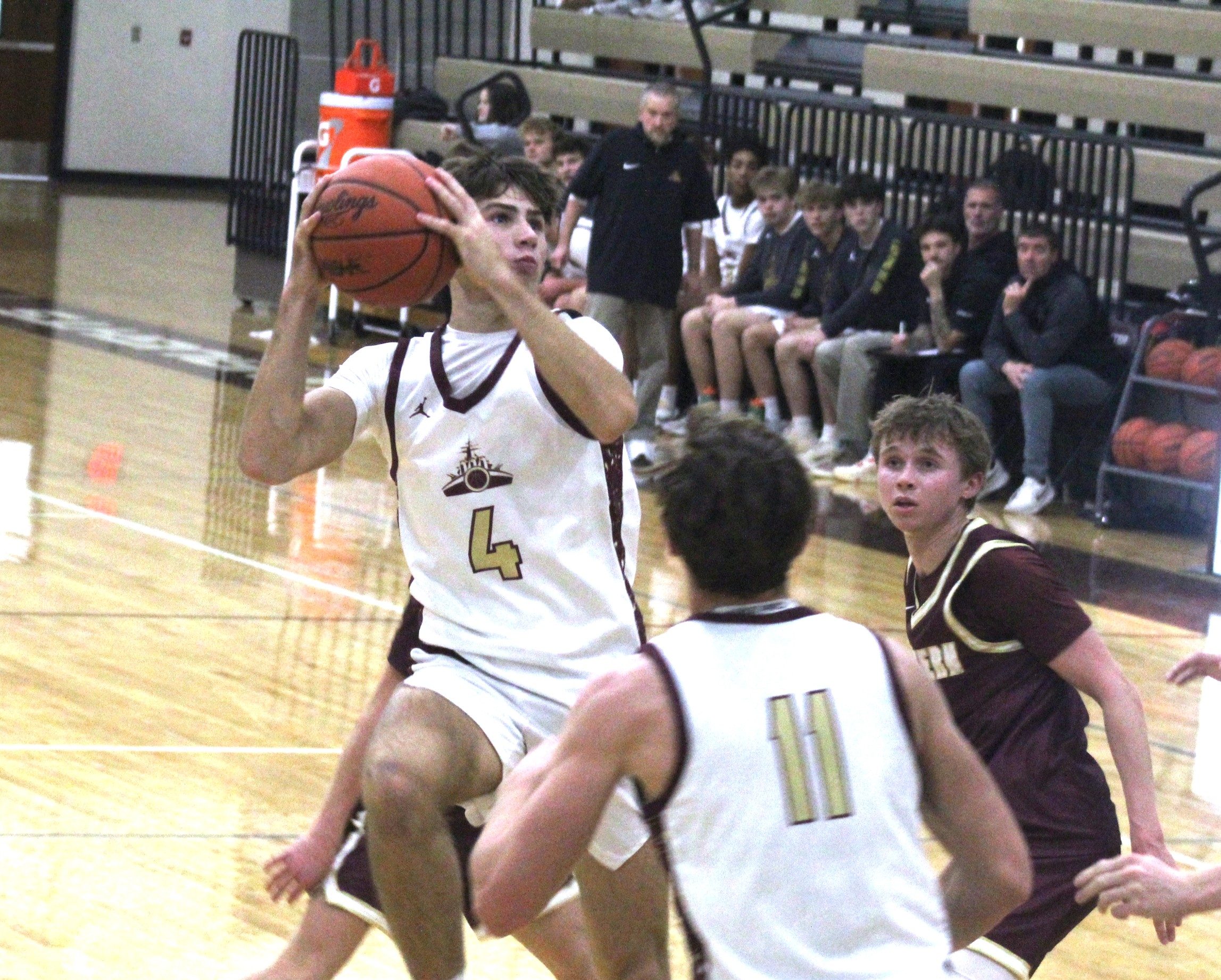 Dexter Basketball Splits Pair to Open Season