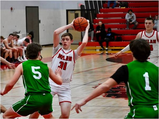 Milan Boys Basketball Drops One to Grosse Ile