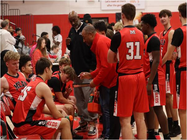 Strong D helps Milan Boys Basketball Defeat Garden City
