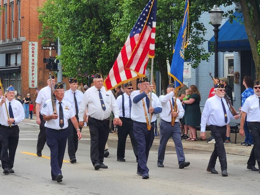 As Flags Fly and Bands March, Local Communities Pause to Remember the Fallen - The Sun Times News